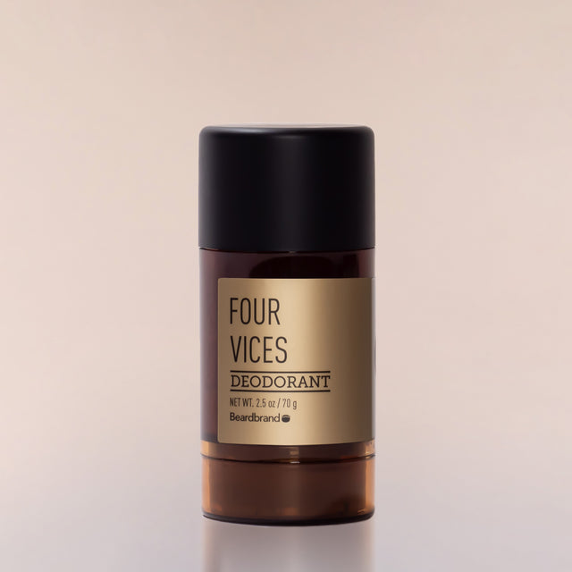 A round tube of Beardbrand Four Vices Deodorant against a neutral background.