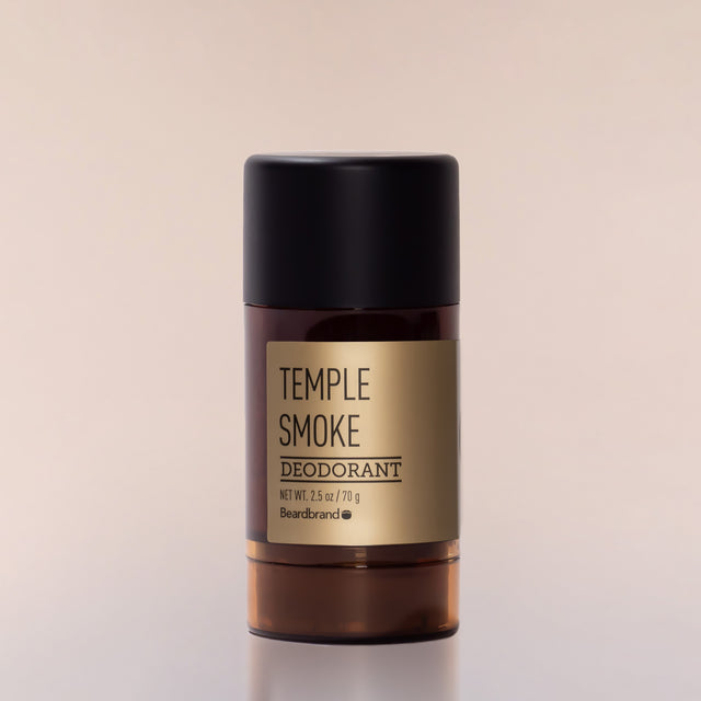 A round tube of Beardbrand Temple Smoke Deodorant against a neutral background.